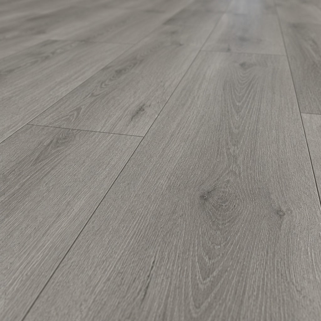 Nordvik Fjord Grey SPC vinyl plank close-up showing grain and bevelled edges